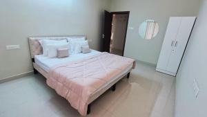 Katil atau katil-katil dalam bilik di Golden sand 1 BHK