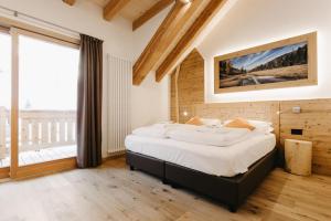 Postel nebo postele na pokoji v ubytování Hotel Aurai + 37 fotografií
