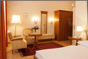 Postel nebo postele na pokoji v ubytování Hotel Kaiserin Elisabeth