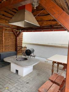 Posedenie v ubytovaní Aranyfürt Apartmanház