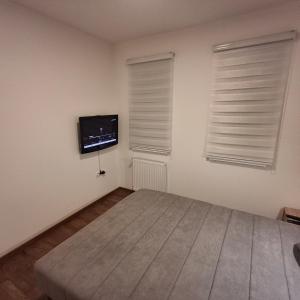 Katil atau katil-katil dalam bilik di APARTMAN studio DADO