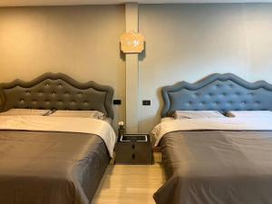 En eller flere senge i et værelse på Lajida pool villa + 8 billeder