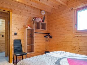 Postel nebo postele na pokoji v ubytování Le Chalet au vieux vignoble avec espace Sauna et Jacuzzi
