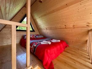 Katil atau katil-katil dalam bilik di green cottage in sioni მწვანე კოტეჯი სიონში +12 gambar