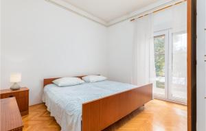 Posteľ alebo postele v izbe v ubytovaní Apartment Vocarska Ii