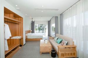 Hainan Four Seasons Nostalgia B&B房間的床