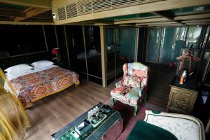 Hainan Four Seasons Nostalgia B&B房間的床