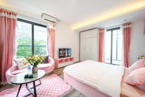 Ένα ή περισσότερα κρεβάτια σε δωμάτιο στο Luxe Paradise Apartment To Ngoc Van Ha Noi