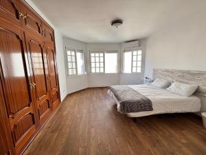 Łóżko lub łóżka w pokoju w obiekcie Villa Casa Vega Fuengirola
