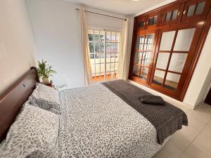 Łóżko lub łóżka w pokoju w obiekcie Villa Casa Vega Fuengirola
