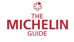 a logo for the michelin guide at Lure Hotel & Spa - Adults Only in Mellieħa