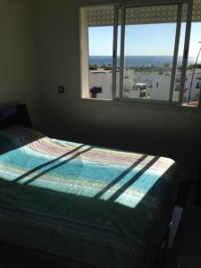 Postel nebo postele na pokoji v ubytování Alcudia Smir