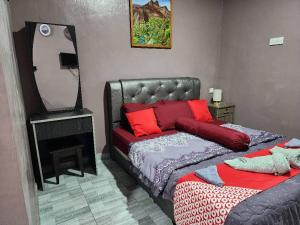 Postel nebo postele na pokoji v ubytování Inspire Rooms Langkawi
