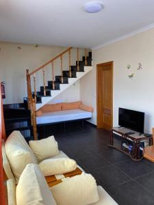 TV a/nebo společenská místnost v ubytování Ocean Guest House