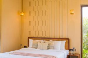 ELIVAAS Cows & Cuddles 4 BHK with Pvt Pool and Garden客房内的一张或多张床位