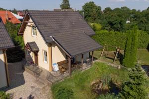 an overhead view of a house with a roof at Sun Village Domki in Stegna
