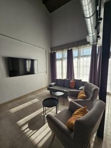 Posezení v ubytování Alojamiento El Pez Casa con piscina climatizada + 37 fotografií