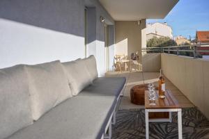 Posezení v ubytování Belle Escale - T3 cosy avec grande terrasse