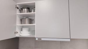 Kuchyň nebo kuchyňský kout v ubytování Grec Maison Piraeus by GrecCollection