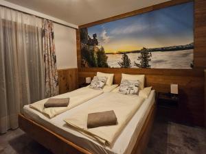 Letto o letti in una camera di Berghof Mitterberg