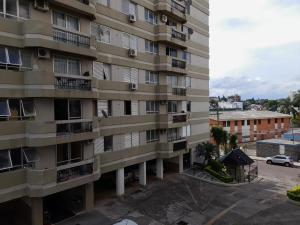 an aerial view of a tall apartment building at Condomino Bi Nacional in Santana do Livramento