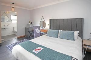 Ένα ή περισσότερα κρεβάτια σε δωμάτιο στο The Chameleon Stay @107 +45 φωτογραφίες