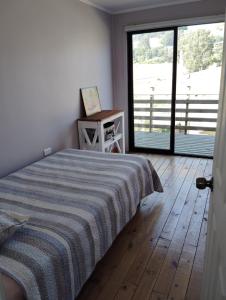 Cama ou camas em um quarto em CasaMagnolia