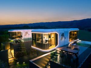 a house with a swimming pool on top of it at PARACH RESORT KHAOKHo in Khao Kho