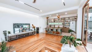 TV a/nebo společenská místnost v ubytování Chez Judy Resort
