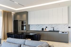 Kuchyň nebo kuchyňský kout v ubytování Day LUX Premium Apartments