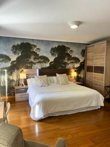 Ένα ή περισσότερα κρεβάτια σε δωμάτιο στο Apartamentos San Antonio