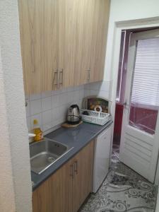Η κουζίνα ή μικρή κουζίνα στο Palma Apartman