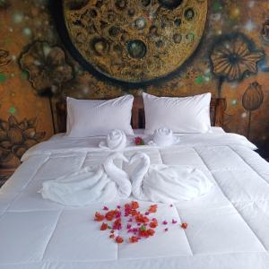 Postel nebo postele na pokoji v ubytování Sangdaenouaichai resort + 5 fotografií