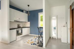 Kuchyň nebo kuchyňský kout v ubytování Happy Guest Apartments - Blue Apartment