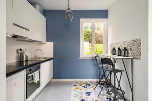 Kuchyň nebo kuchyňský kout v ubytování Happy Guest Apartments - Blue Apartment