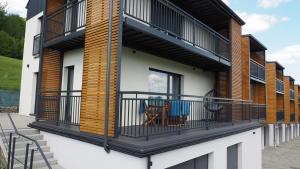 Balkón nebo terasa v ubytování RelaxApart - Komfortowy apartament z prywatną sauną