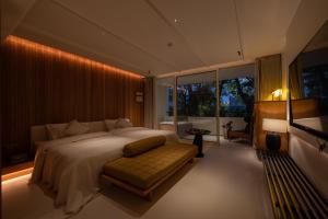 Foto Jinghongis asuva majutusasutuse Anlai Rainforest Wild Luxury Hotel galeriist