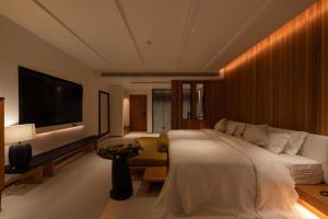 Foto Jinghongis asuva majutusasutuse Anlai Rainforest Wild Luxury Hotel galeriist