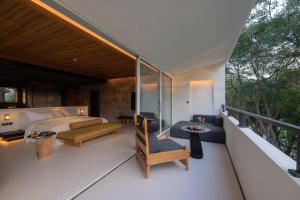 Foto Jinghongis asuva majutusasutuse Anlai Rainforest Wild Luxury Hotel galeriist