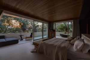Foto Jinghongis asuva majutusasutuse Anlai Rainforest Wild Luxury Hotel galeriist