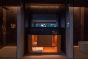 Foto Jinghongis asuva majutusasutuse Anlai Rainforest Wild Luxury Hotel galeriist