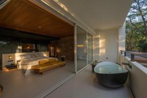 Foto Jinghongis asuva majutusasutuse Anlai Rainforest Wild Luxury Hotel galeriist