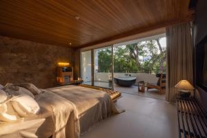 Foto Jinghongis asuva majutusasutuse Anlai Rainforest Wild Luxury Hotel galeriist