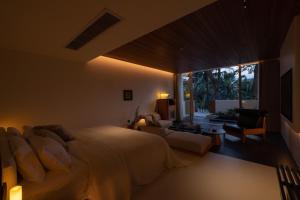 Foto Jinghongis asuva majutusasutuse Anlai Rainforest Wild Luxury Hotel galeriist