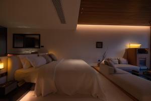Foto Jinghongis asuva majutusasutuse Anlai Rainforest Wild Luxury Hotel galeriist