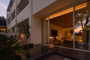 Foto Jinghongis asuva majutusasutuse Anlai Rainforest Wild Luxury Hotel galeriist