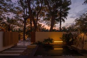 Foto Jinghongis asuva majutusasutuse Anlai Rainforest Wild Luxury Hotel galeriist