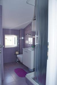 Kúpeľňa v ubytovaní Apartments Villa Rosina