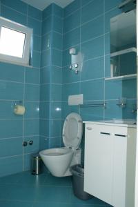 Kúpeľňa v ubytovaní Apartments Villa Rosina + 37 fotografií