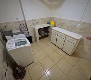 Kuchyň nebo kuchyňský kout v ubytování Hostel Chico Lessa